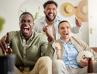 Image showing Were on the winning team. three male friends looking cheerful while drinking beers and sitting together.