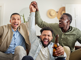 Image showing Now we out and celebrate. three male friends looking cheerful while drinking beers and sitting together.