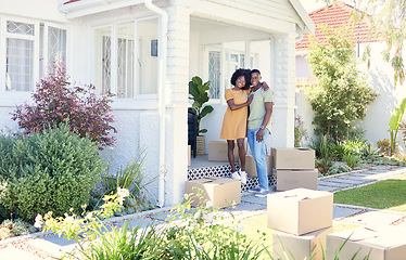 Image showing Unlocked a new chapter. a young couple moving into their new house.