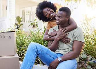 Image showing Every embrace is precious. a young couple moving into their new house.