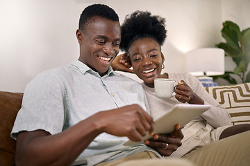 Image showing Relaxing days at home with you is all I want. a young couple using a digital tablet together at home.