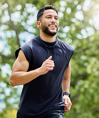 Image showing A morning run leaves me feeling energised and ready for the day. a sporty young man running outdoors.