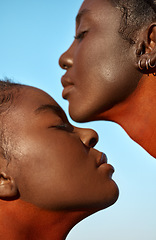 Image showing Spiritual strength from another. two beautiful tribal women posing outside together.