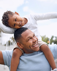 Image showing Safe to say that Dads the favourite around here. a father and son having fun in their backyard at home.