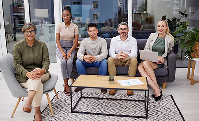 Image showing Full body portrait of diverse group of businesspeople sitting in the office at night and brainstorming. Team of professional workers working a deadline and using a laptop and paperwork in a meeting