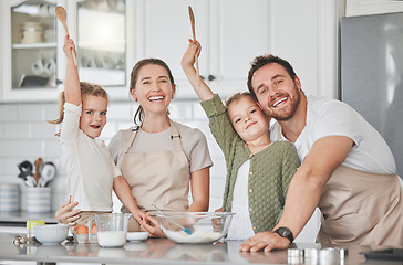 Image showing So we baked and sweated together. adorable little girls baking with their parents at home.