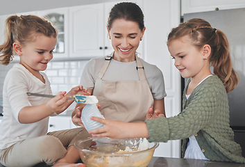 Image showing Baking is done out of love. a family baking together in the kitchen.