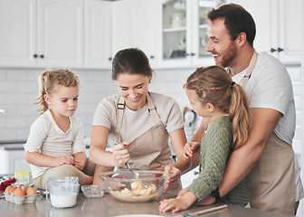 Image showing Always serve too much cookies. a family baking together in the kitchen.