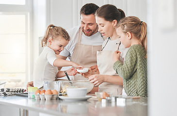 Image showing Without cookies, there would be darkness and chaos. a family baking together in the kitchen.