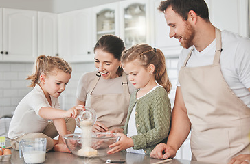 Image showing Baking is like painting or writing a song. a family baking together in the kitchen.