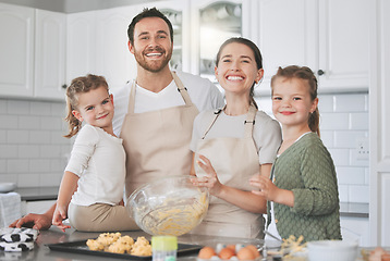 Image showing Baking with kids is not just about ingredients. adorable little girls baking with their parents at home.