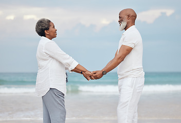 Image showing Happily in too deep. a mature couple spending time at the beach.