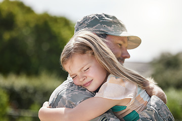 Image showing Family, like the strength of an army. a father returning from the army hugging his daughter outside.