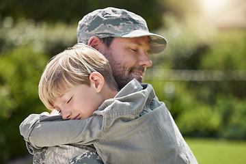 Image showing Family means no one gets left behind. a father returning from the army hugging his son outside.