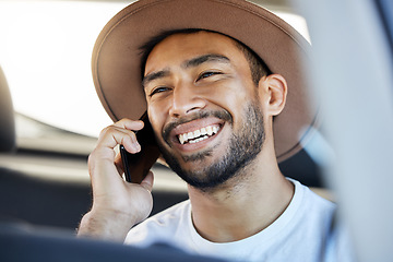 Image showing Healthy, free, the world before me. a young man sitting in a car while using his phone.