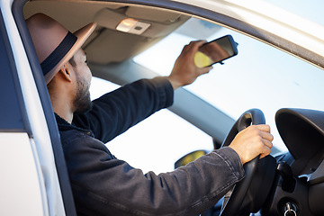 Image showing I take to the open road. a young man taking a selfie in his car.