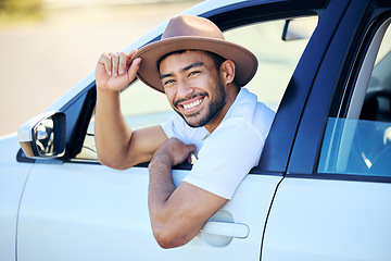 Image showing If you’re on a road trip, you need driving music. a young man enjoying an adventurous ride in a car.