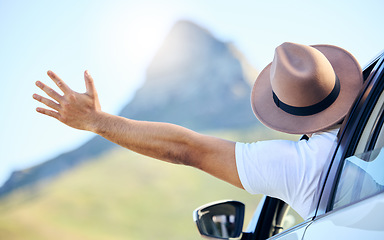 Image showing Look on every exit being an entrance somewhere else. a unrecognizable man enjoying an adventurous ride in a car.