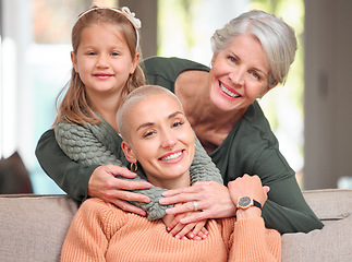 Image showing I got it from my mama. Portrait of a mature woman bonding with her daughter and granddaughter on the sofa at home.