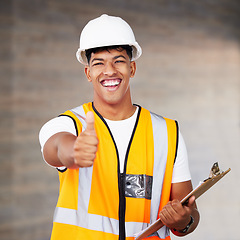 Image showing These hands are magic. a young contractor showing the thumbs up at work.