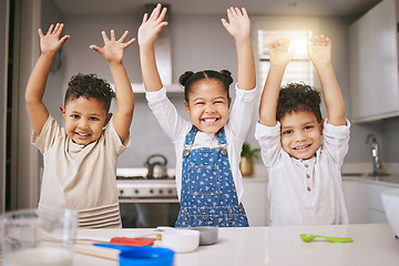 Image showing Its bake day. three cheerful siblings celebrating while baking in a kitchen.