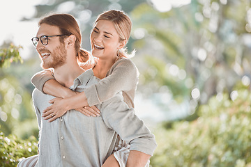 Image showing We can be playful together. a young couple spending time together in the garden at home.