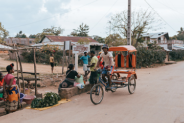 Image showing Traditional rickshaw on the city streets. Rickshaws are a common mode of transport in Madagascar.