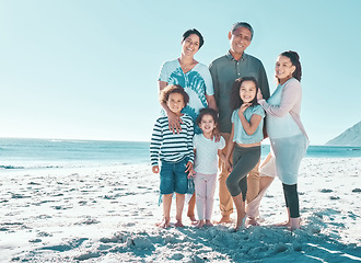 Image showing Its always a good day at the beach. a multi-generational family spending the day at the beach.