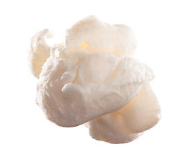 Image showing Ready to pop. a popped piece of popcorn against a studio background.