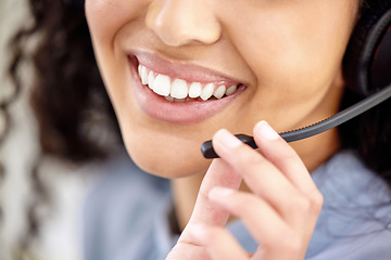 Image showing Let me know if you need any assistance. Closeup shot of an unrecognisable businesswoman wearing a headset while working in a call centre.