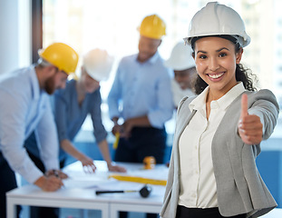 Image showing Are we doing a good job. a young businesswoman showing a thumbs up at work.