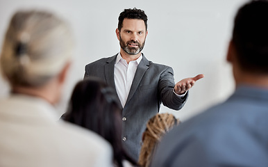 Image showing Now is the time for questions. a mature man delivering a presentation.