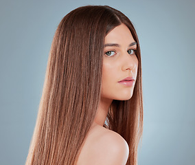 Image showing I maintain a healthy haircare routine. Studio shot of a beautiful young woman showing off her long brown hair.