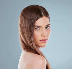 Image showing Proper hair care is important. Studio shot of a beautiful young woman showing off her long brown hair.