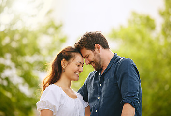 Image showing You bring me so much joy. a young couple spending time together in nature.