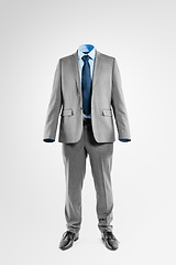 Image showing Lets talk employee recognition. Studio shot of an invisible businessman standing against a grey background.