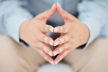 Image showing The nerves are kicking in. Closeup shot of an unrecognizables hands while sitting nervously in the studio.