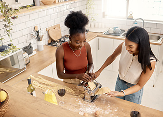 Image showing Life is what you bake of it. two young friends cooking together at home.