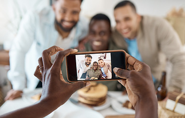 Image showing They came camera ready. a group of friends taking pictures together at a birthday celebration.