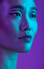 Image showing Have that beauty hangover. an attractive young woman posing in studio against a purple background.