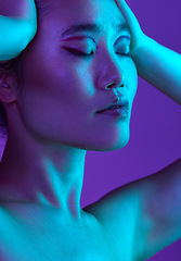 Image showing Bought a brand new attitude. an attractive young woman posing in studio against a purple background.