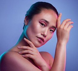 Image showing Honey bee, buzz buzz. an attractive young woman posing in studio against a purple background.