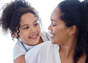 Image showing She adores her mom. a little girl bonding with her mother at home.