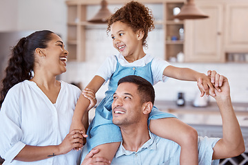 Image showing When we have each other, we have everything. a little girl bonding with her parents at home.