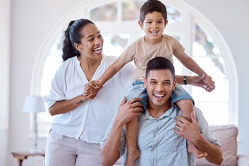 Image showing Happiness is seeing your kids happy. Portrait of a little boy bonding with his parents at home.