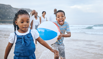 Image showing The beat of morning. a young brother and sister bonding at the beach.