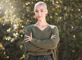 Image showing Confidence is my middle name. Cropped portrait of an attractive young woman standing with her arms folded outdoors.