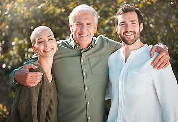 Image showing Im glad the men in my life get along. Cropped portrait of a handsome mature man standing outside with his daughter and son-in-law.