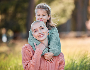 Image showing I do it for my little girl. a little girl spending the day outdoors with her mother.