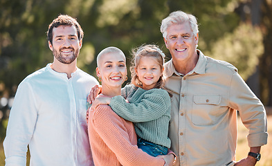 Image showing If youre part of a family, youre part of something great. a multi-generational family posing together outdoors.